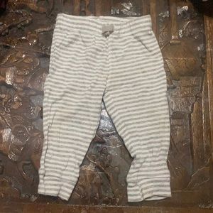 Striped joggers with Santa penguin on back